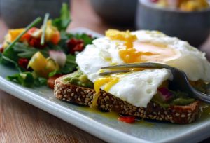 Eggs on toast with salad